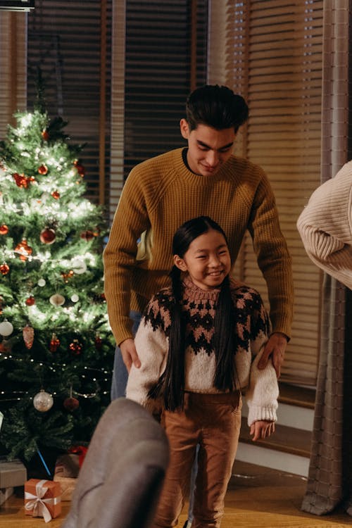 Father and Daughter Celebrating Yuletide Together