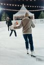 Back View of a Person Doing Ice Skating
