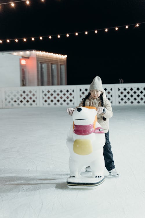 A Young Girl Playing in the Snow