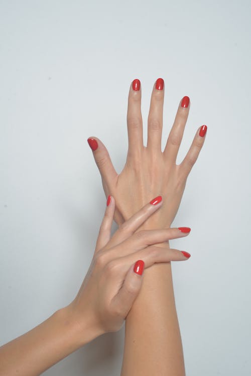 Free Beautiful Hands with Red Manicure Stock Photo