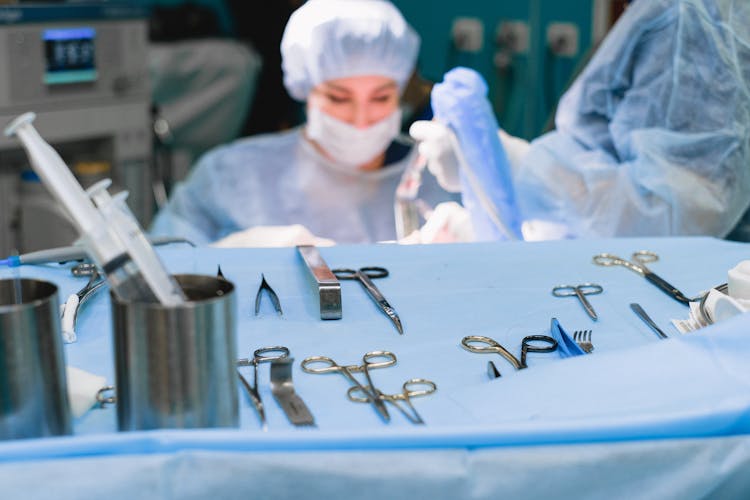 Surgical Equipment And Surgeon Performing Surgery 