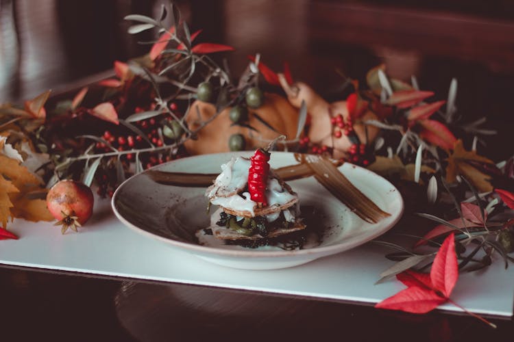 Spicy Food Surrounded By Autumn Decoration