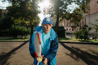 Elderly Man Playing Tennis