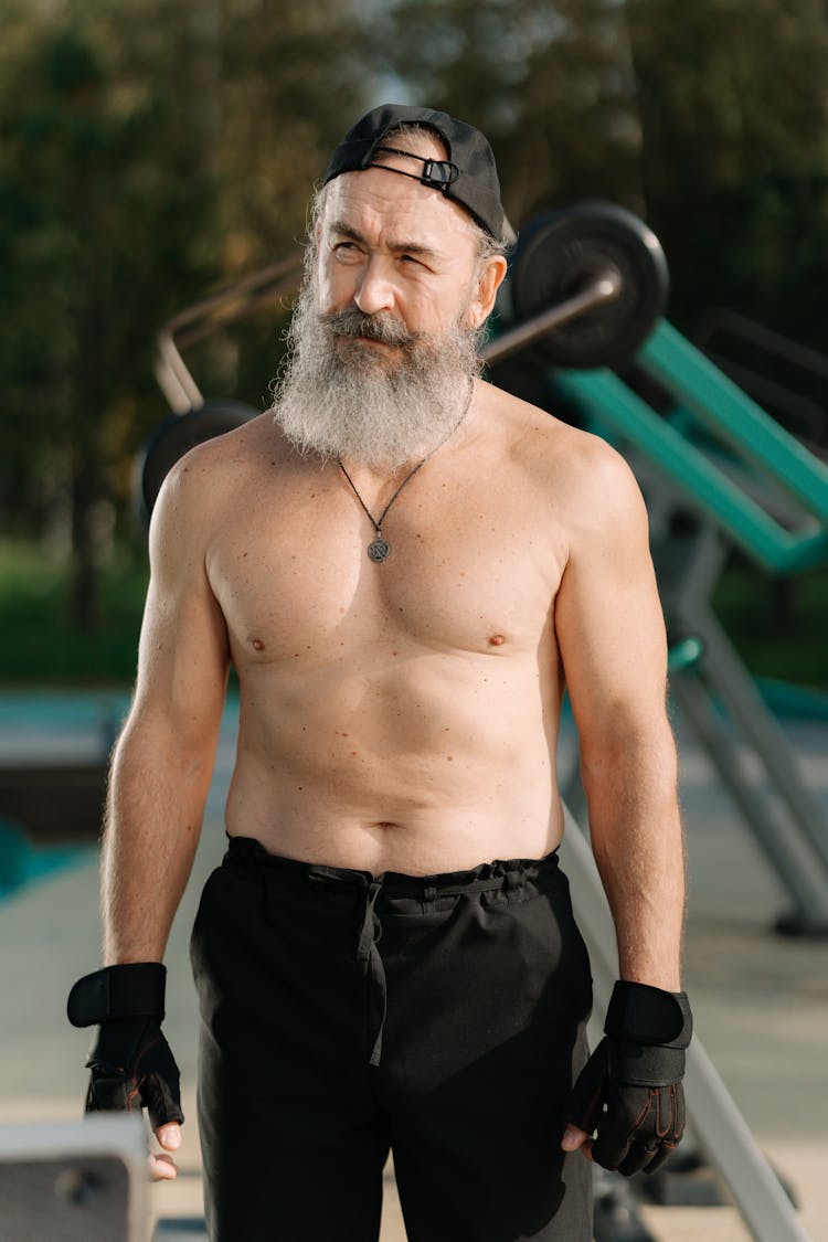 Shirtless Masculine Elderly Man Standing