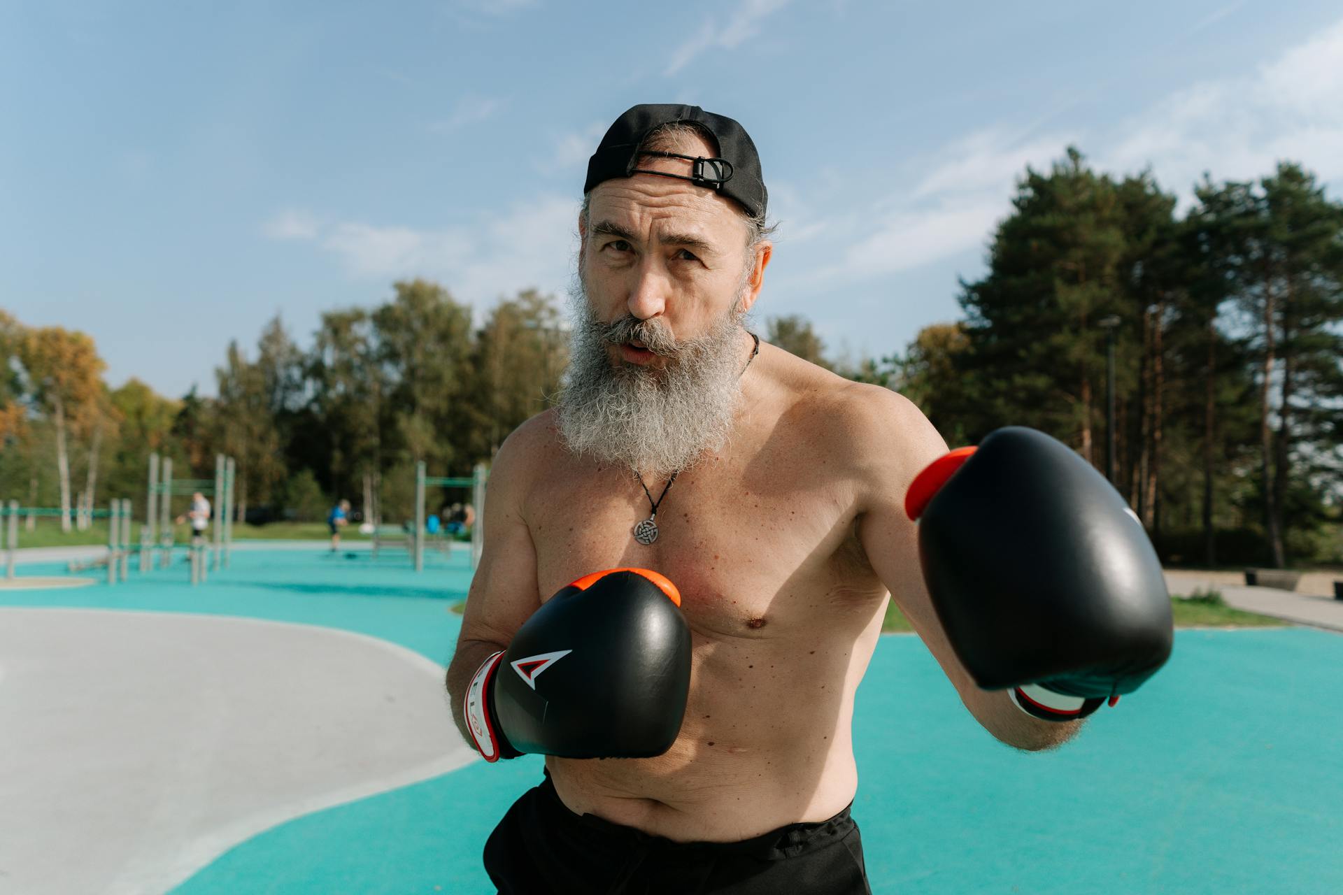 A Bearded Man Wearing Boxing Gloves