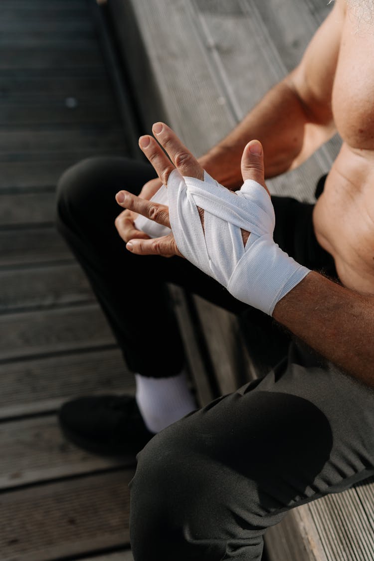 Boxer Wrapping His Hands