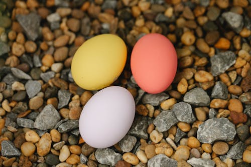 Colorful Easter eggs on pebble