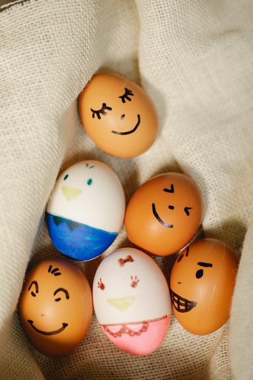 Painted eggs placed on fabric
