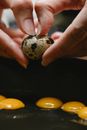 Crop cook cooking quail eggs in pan