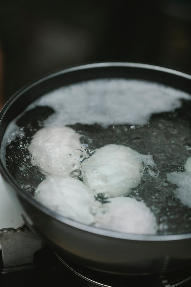 Saucepan With Eggs In Boiling Water