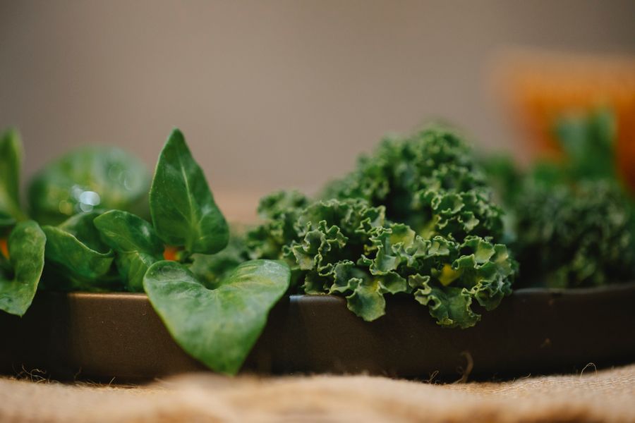 Green leafy vegetables on a kitchen counter — the richest dietary source of lutein for macular eye health