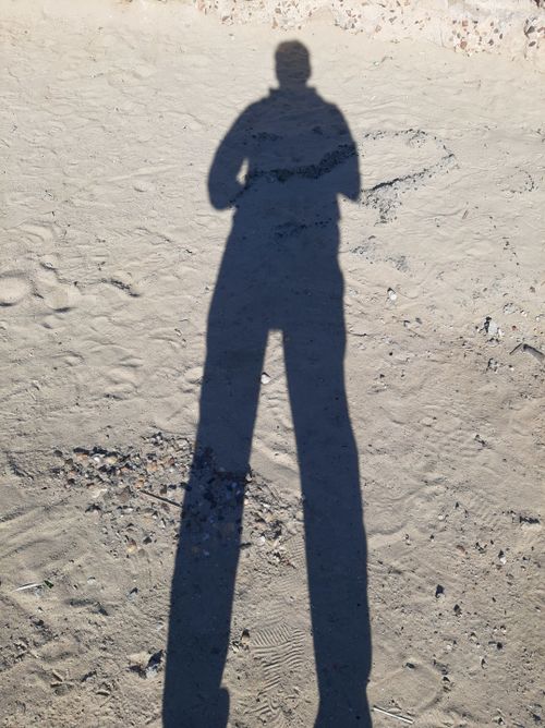 Free stock photo of beach sand, bright sun, light and shadow Stock Photo