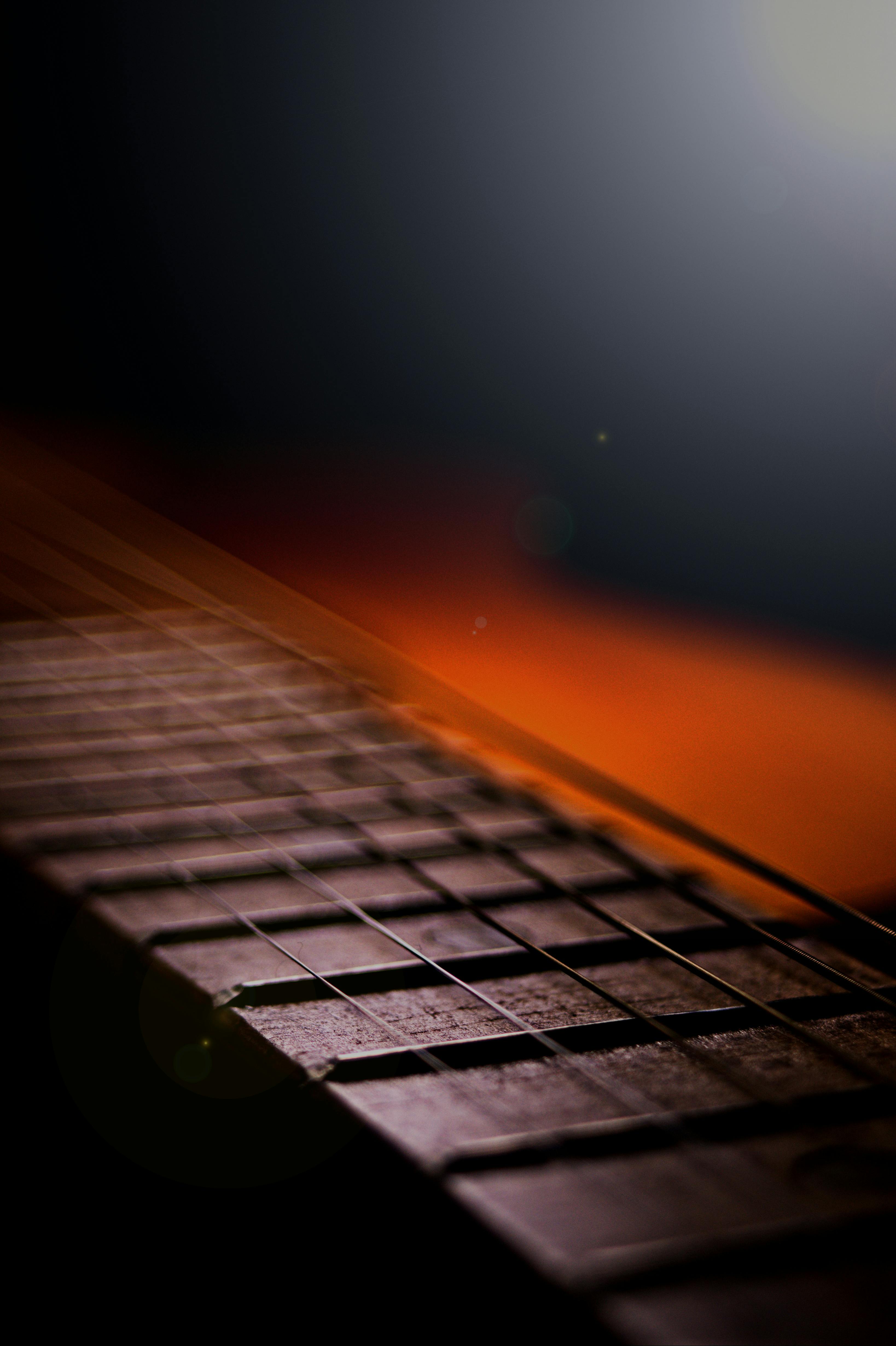 Close Up Shot of an Acoustic Guitar · Free Stock Photo