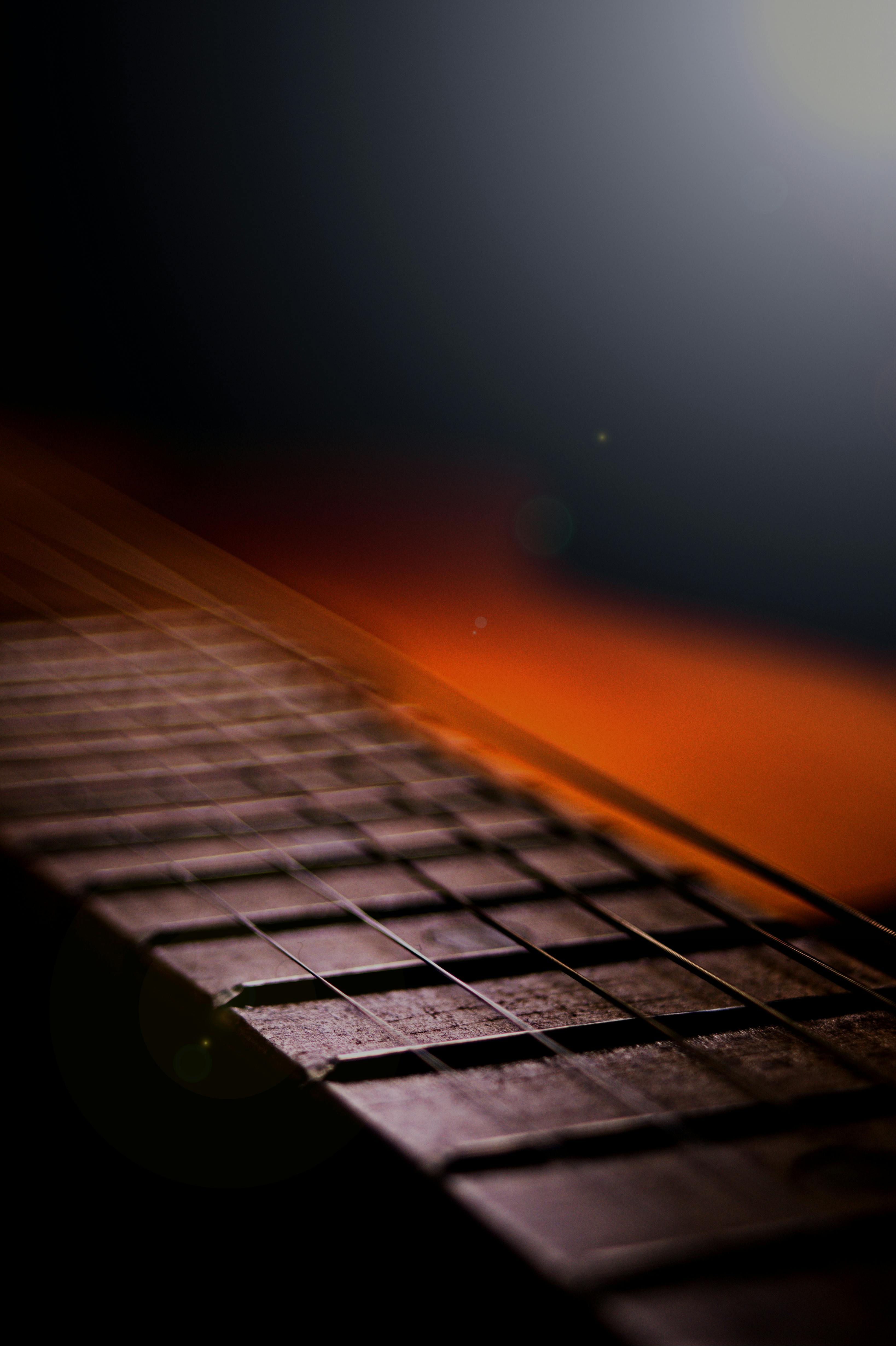 Close Up Shot of an Acoustic Guitar · Free Stock Photo Close Up Shot of an Acoustic Guitar · Free Stock Photo