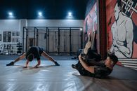 Men on the Floor Stretching