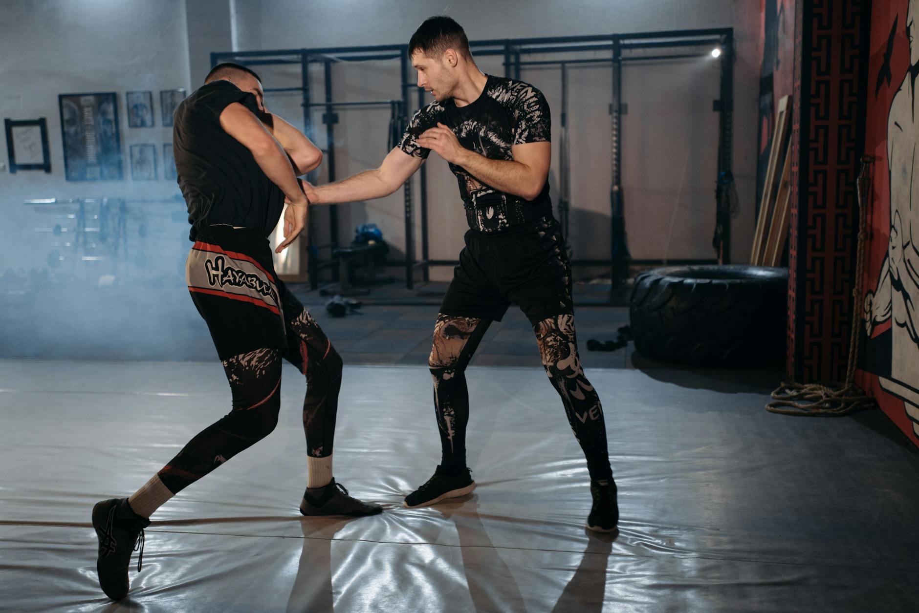 A Man Working Out with His Trainer