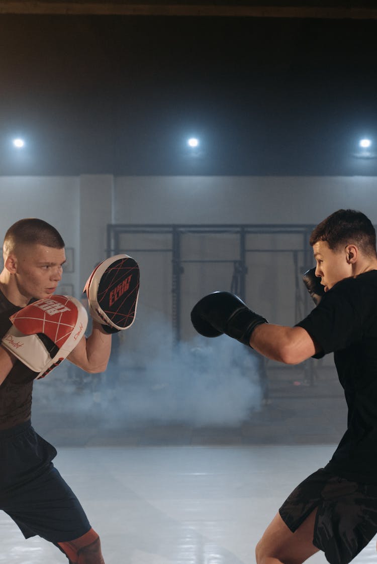 Man Boxing Wearing Black Gloves