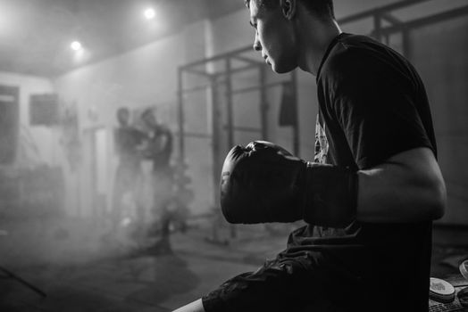 Boxing pad work training - Photo by Pavel Danilyuk