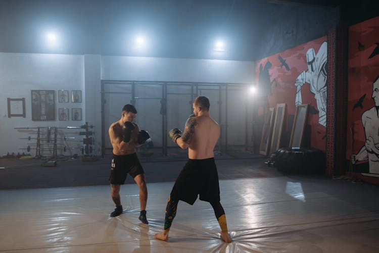 Men Sparring In The Gym