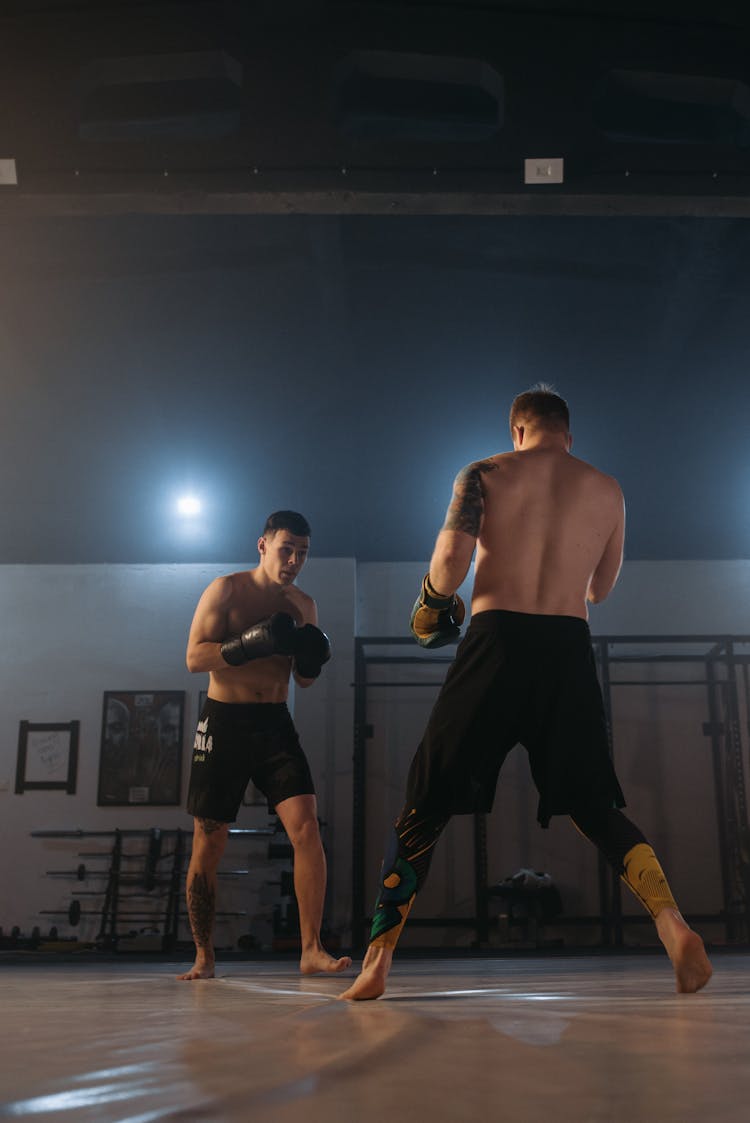 Men Sparring In The Gym