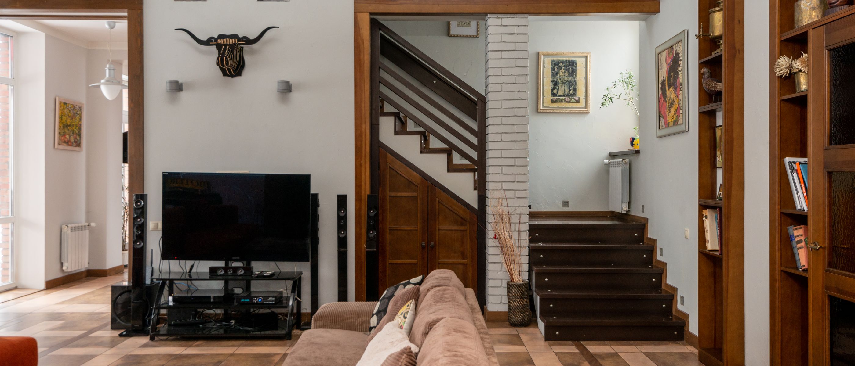 Masonry and Render Painting in Hackney Central — dust sheets down and the room fully protected