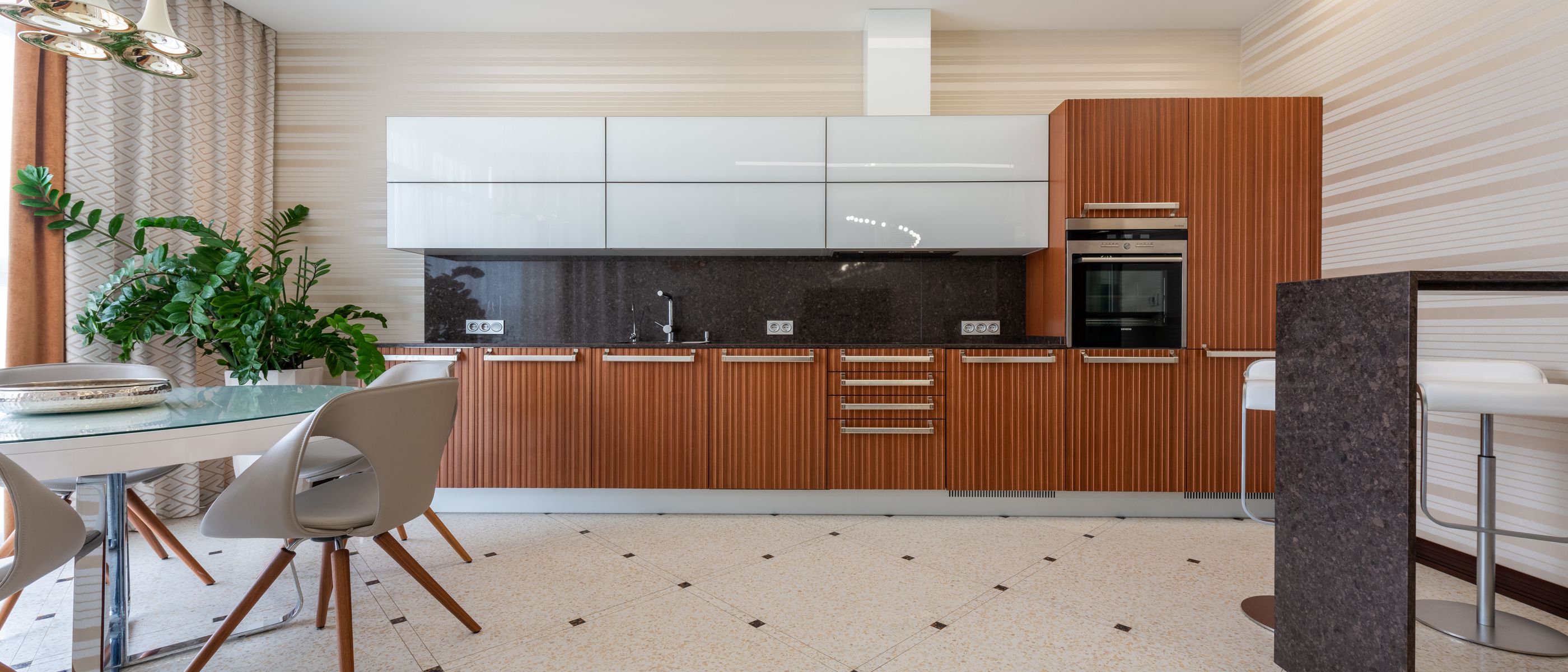 Kitchen Spraying in Woodlands — a decorator at work mid-project