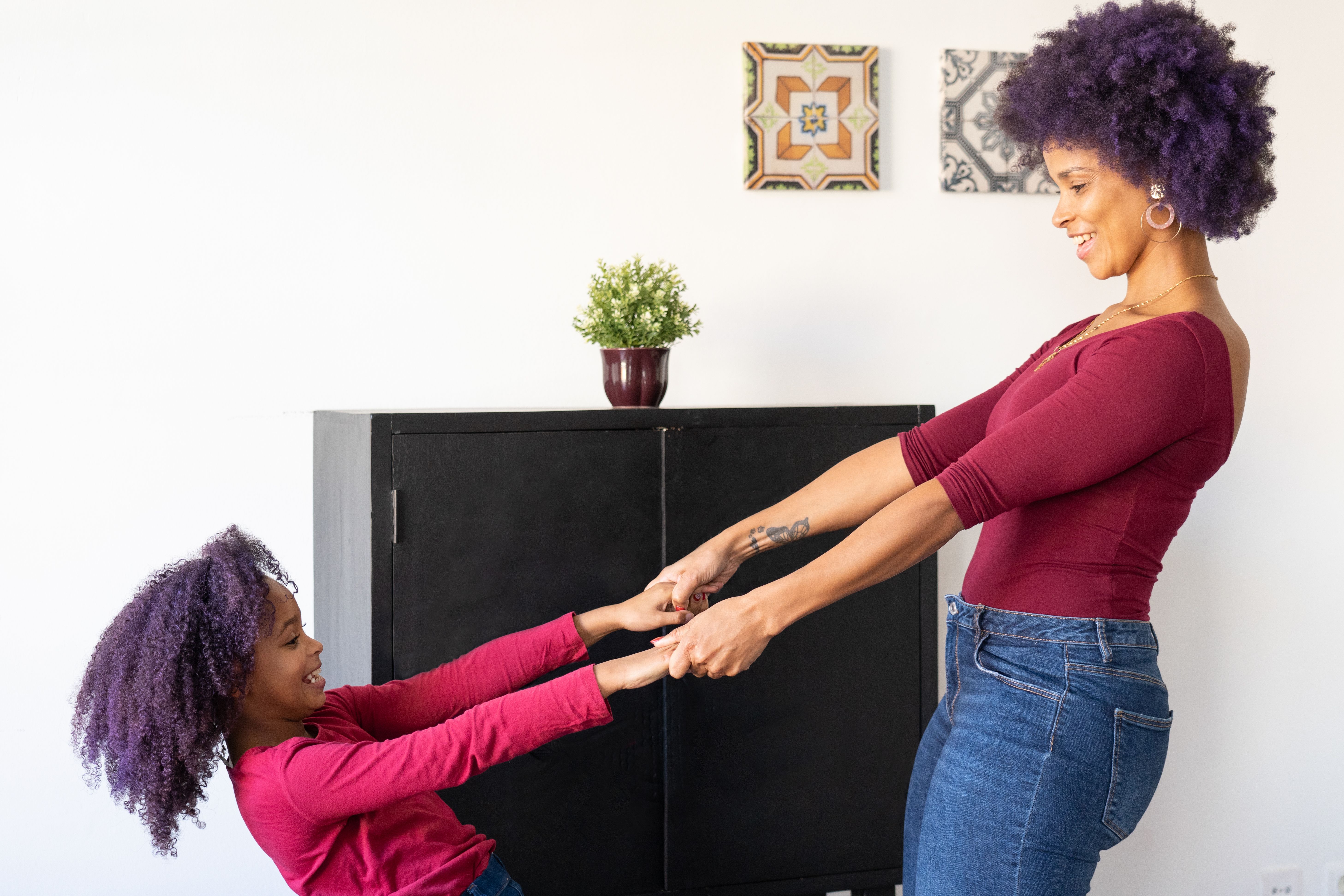 Mother and Daughter Standing while Holding Hands · Free Stock Photo