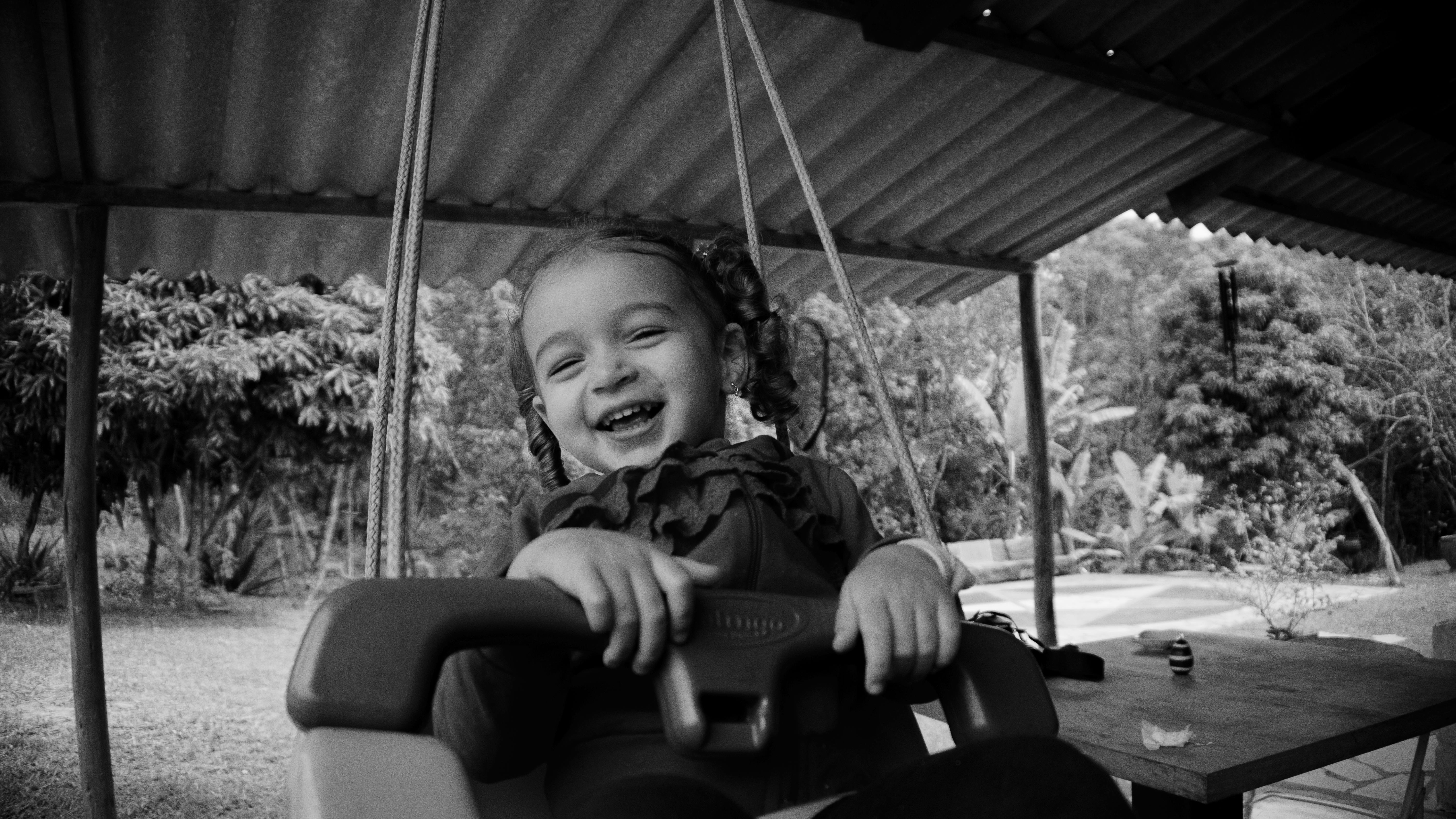 cute little girl on swings