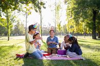 People Sitting on Grass Field