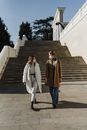 Women Wearing Face Masks Walking Together