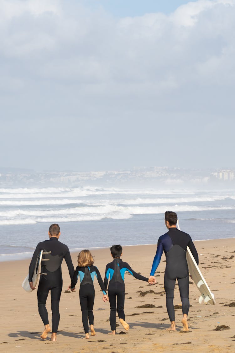 People Walking On The Beach