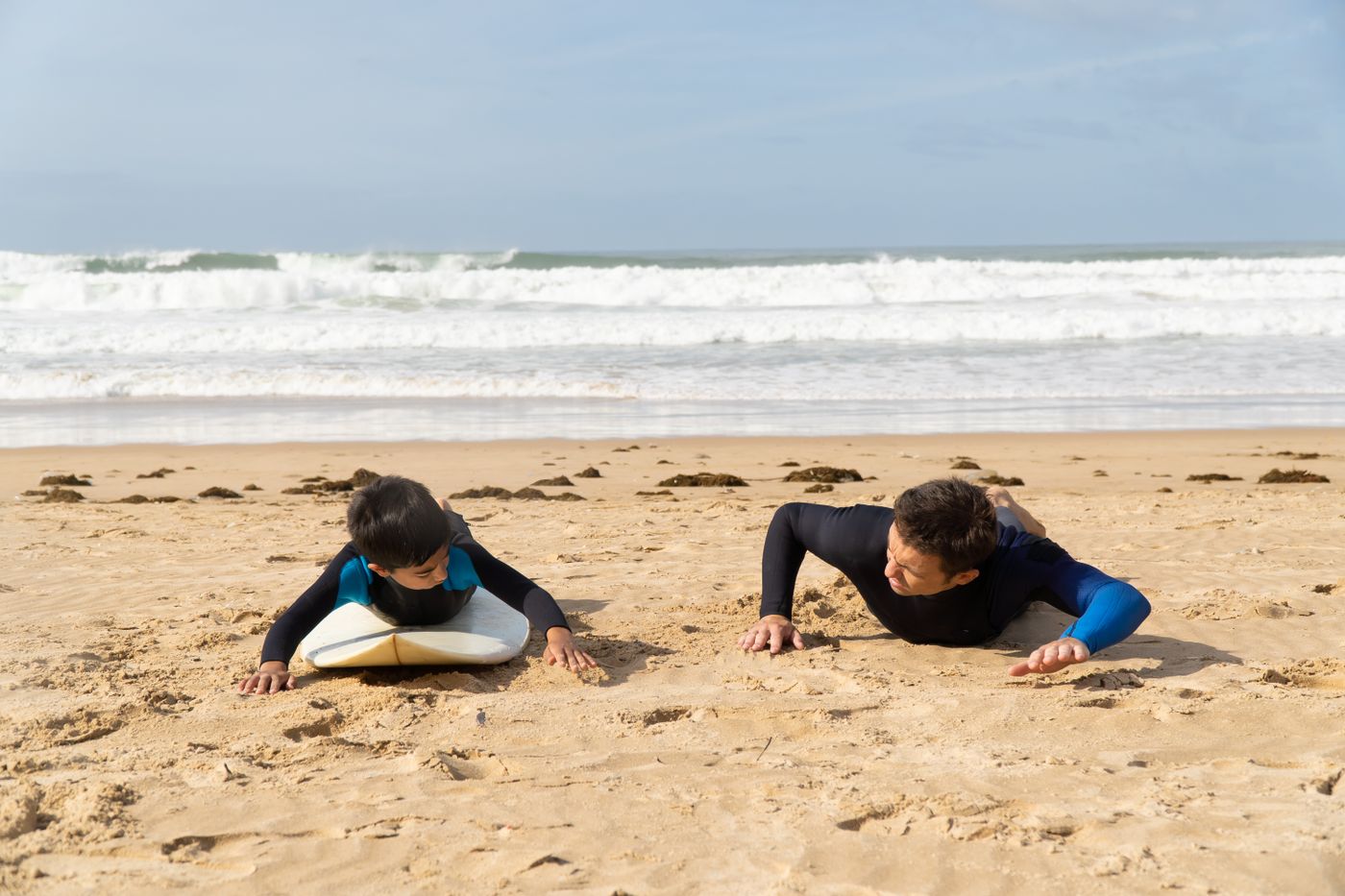 Beginner surf lesson on a sunny beach in Portugal