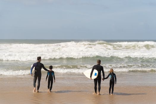 People Walking Towards the Sea