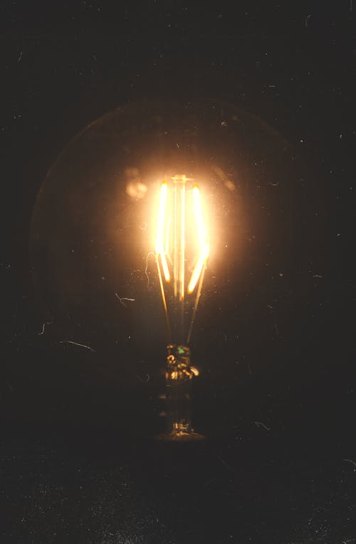 Free Close-up Photo of a Lighted Light bulb Stock Photo
