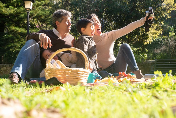 Family Making Faces While Taking A Selfie