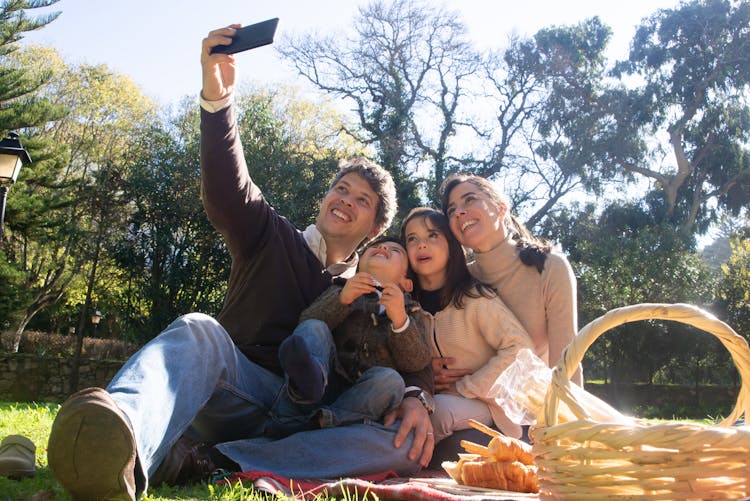 Happy Family Taking A Selfie