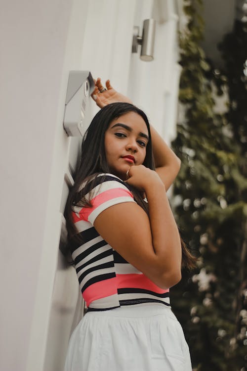 Free Young Woman Posing in Striped Blouse Stock Photo