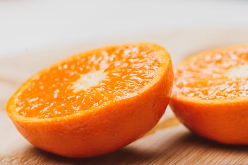 A Close-Up Shot of a Sliced Orange Fruit