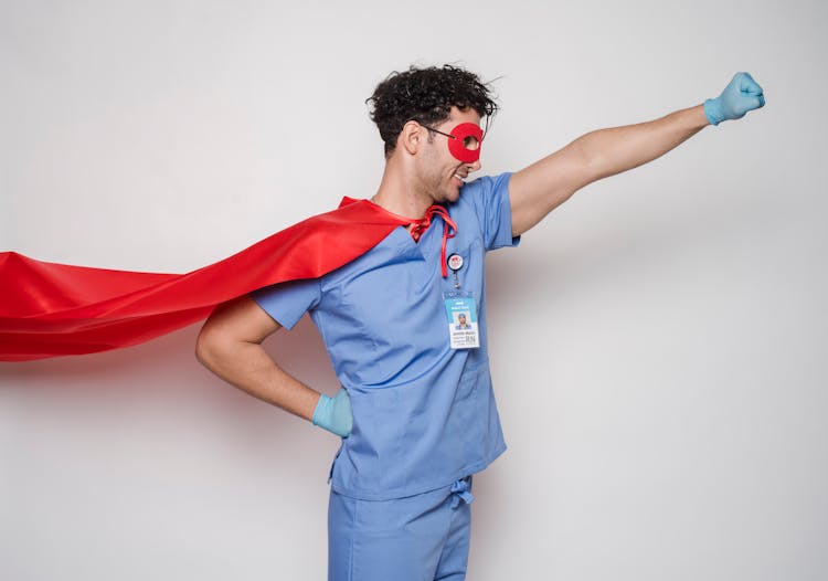 Positive Doctor In Red Superhero Costume