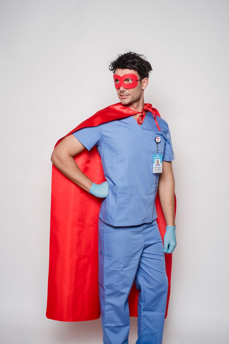 Serious Doctor In Uniform And Superhero Costume