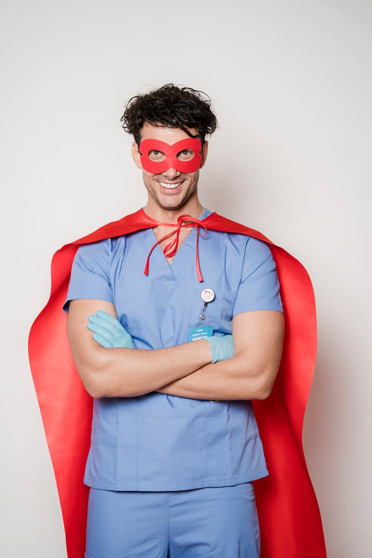 Cheerful Medic In Superhero Costume