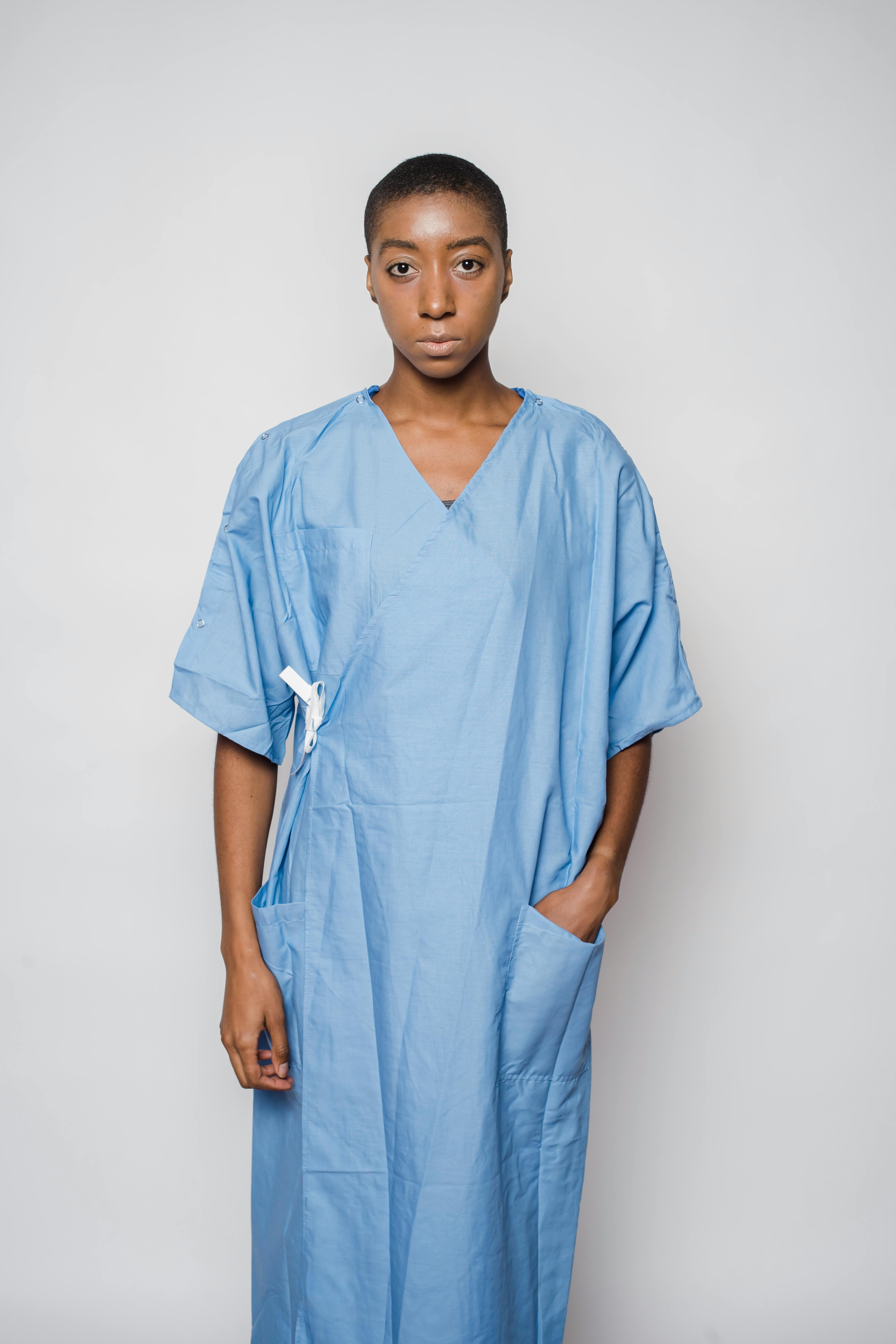 androgynous african american female in medical robe