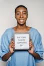 Woman Holding A Black Frame With Text