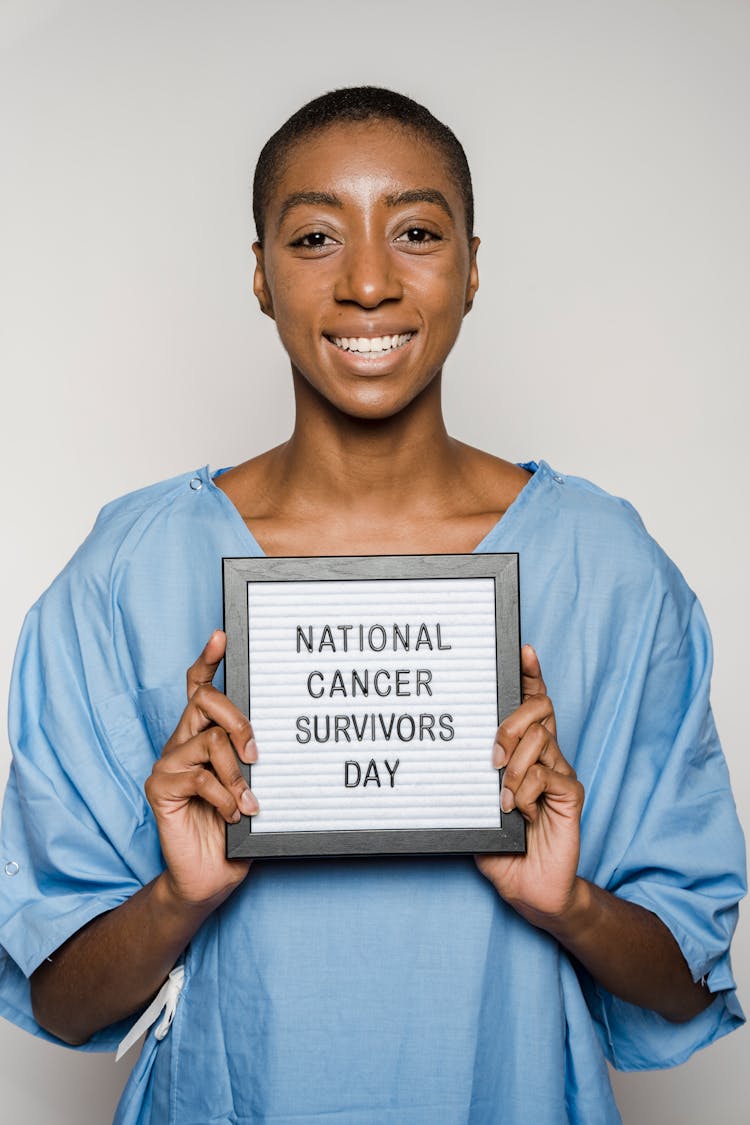 Woman Holding A Black Frame With Text