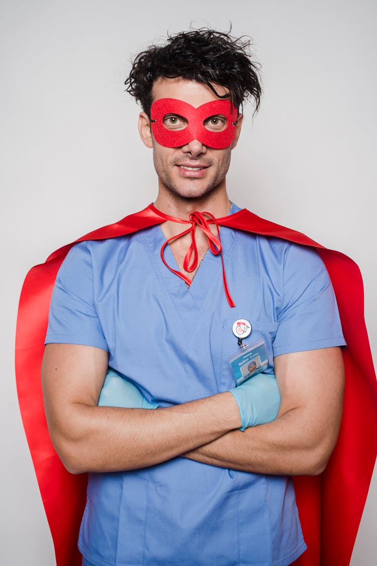 Happy Doctor With Arms Folded In Costume Of Superhero