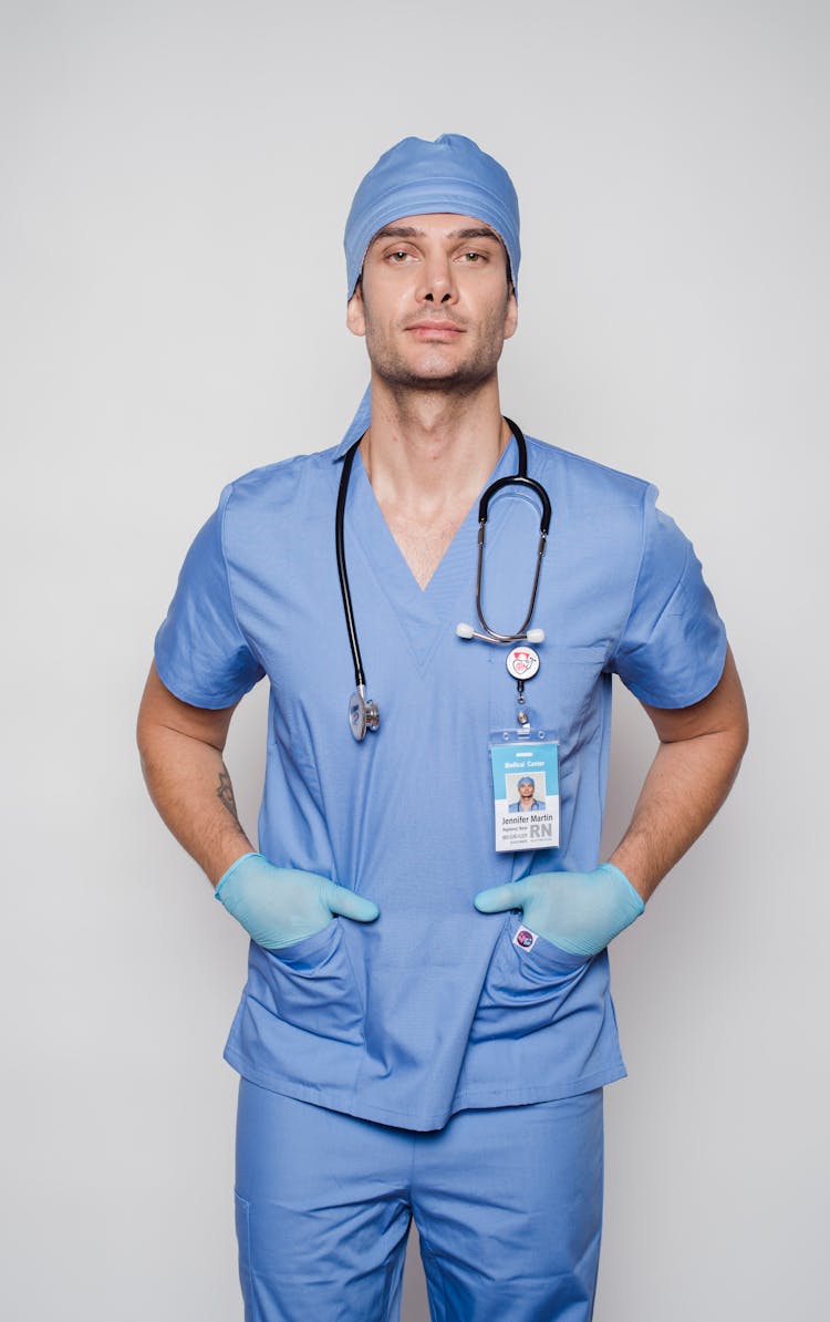 Serious Doctor In Uniform With Stethoscope