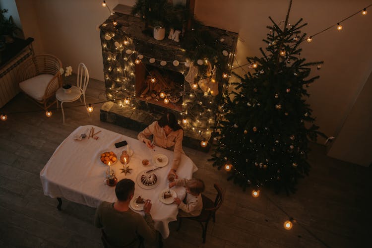 High Angle Shot Of A Family Eating Together 