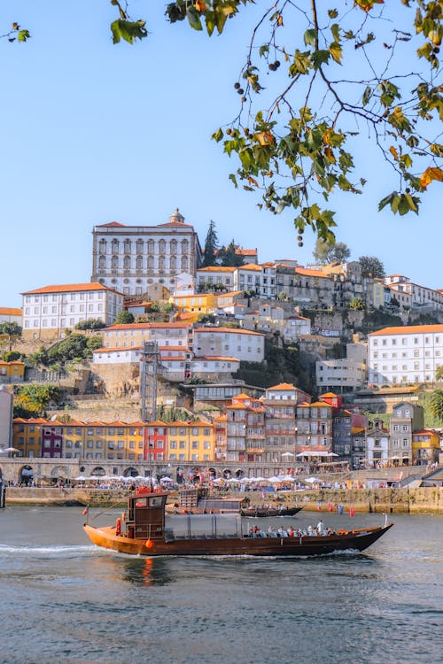 Free A City Buildings Near the Body of Water Stock Photo