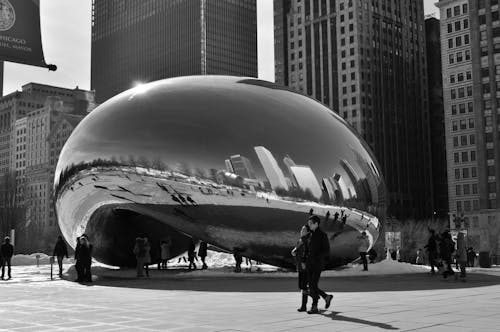 Grayscale Photo of People Walking on the Street