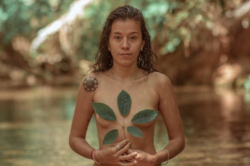 Naked Woman Holding Leaves